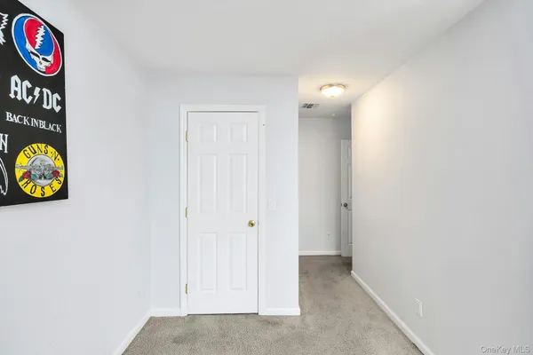 an entryway with wooden floor