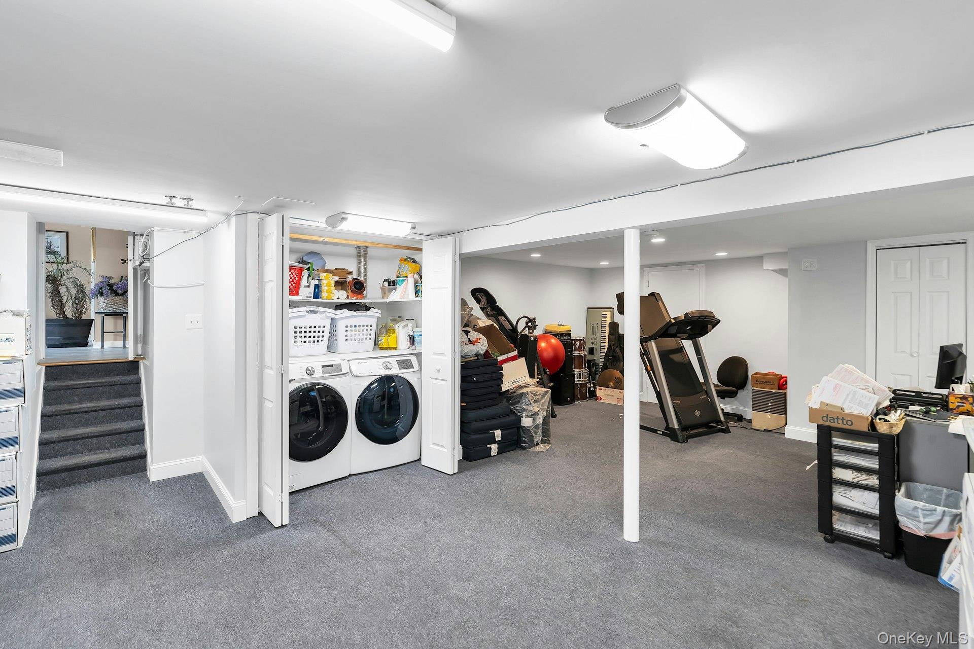 2043 Ripley Lane Merrick, NY 11566 - Photo 34 of 37 a view of a room with gym equipment