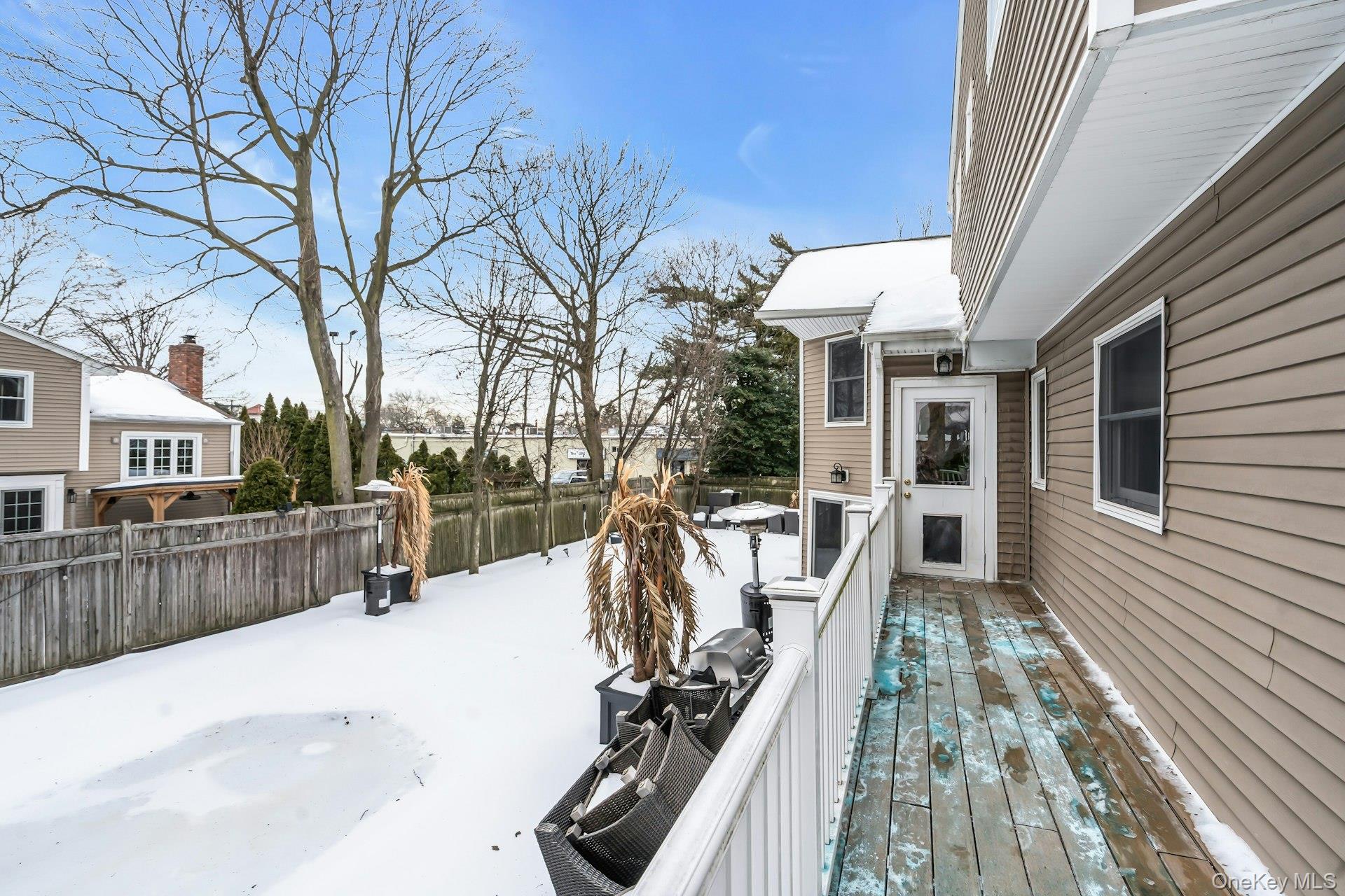 2043 Ripley Lane Merrick, NY 11566 - Photo 35 of 37 a view of a house with backyard and sitting area