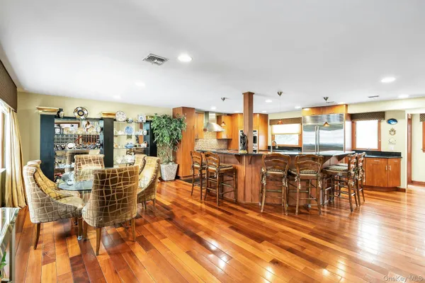a view of a dining room with furniture window and outside view