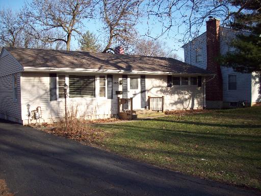 1223 North Main Street Wheaton, IL 60187 - Photo 1 of 6 a view of a house with a garden