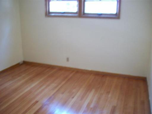 1223 North Main Street Wheaton, IL 60187 - Photo 3 of 6 a view of a small space with wooden floor and a window