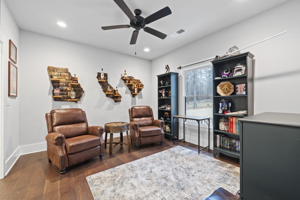 1231 Spinnaker Road Buckhead, GA 30625 - Photo 35 of 86 a living room with furniture and wooden floor