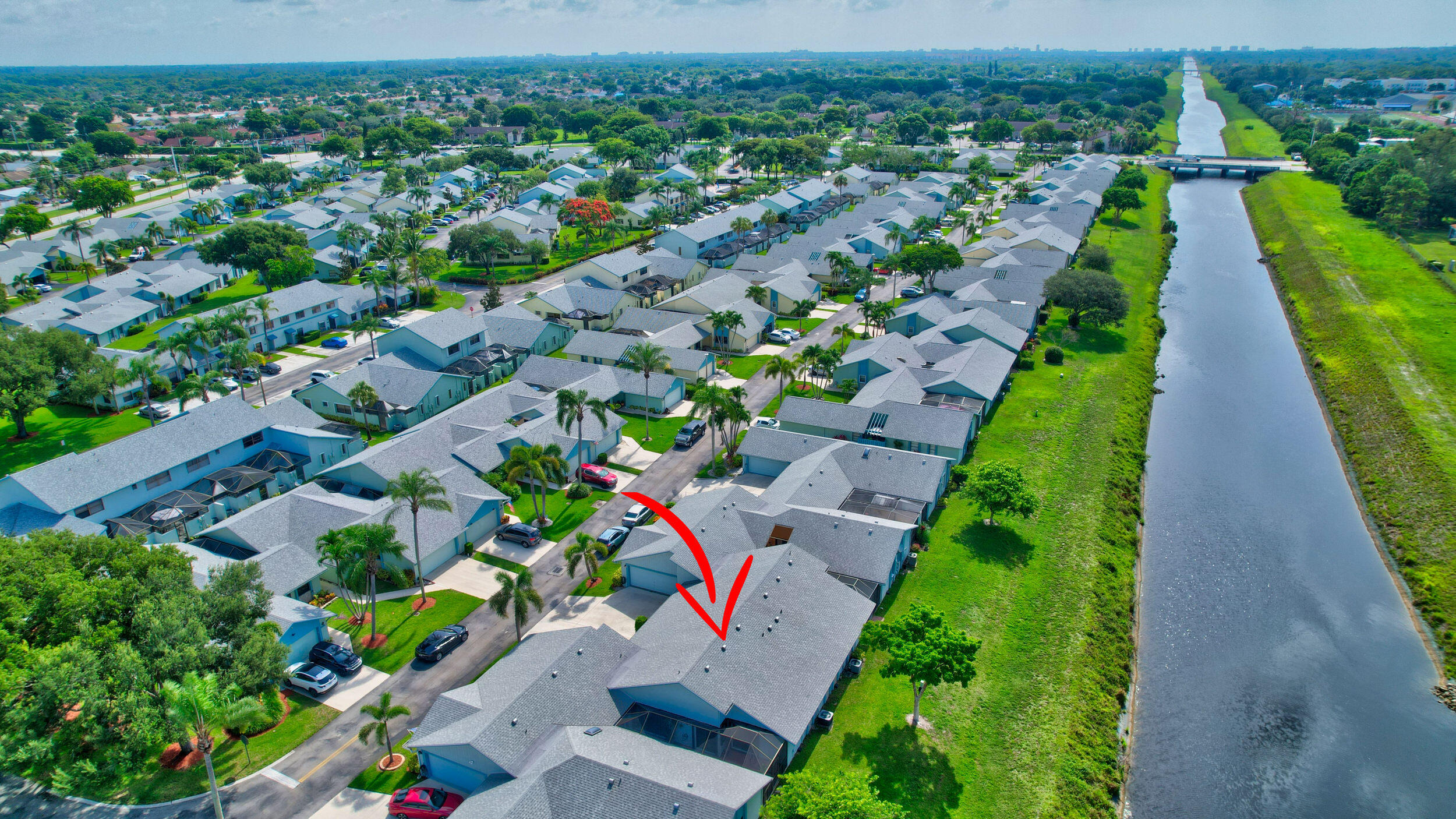 9142 Southwest 22nd Street, Unit D Boca Raton, FL 33428 - Photo 36 of 36 a view of an outdoor space with a garden