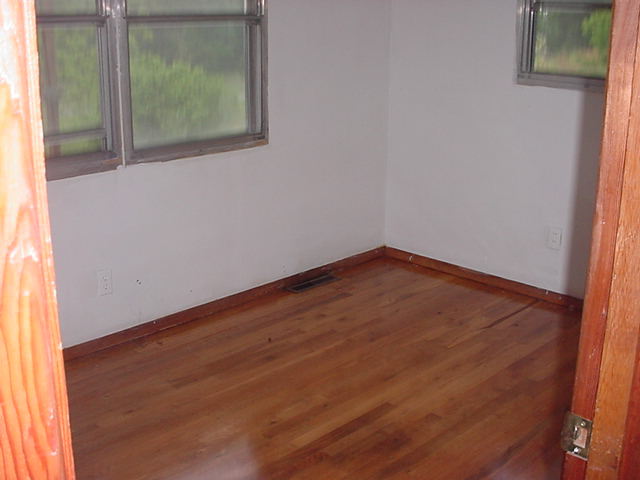 1446 Hopkins Road Rocky Mount, VA 24151 - Photo 5 of 9 an empty room with window