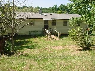 1446 Hopkins Road Rocky Mount, VA 24151 - Photo 9 of 9 a view of a backyard with a garden