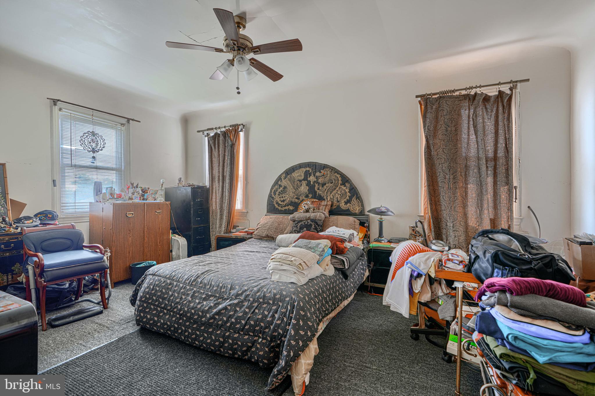 3212 Dorchester Road Baltimore, MD 21215 - Photo 20 of 45 a bedroom with bed and a window
