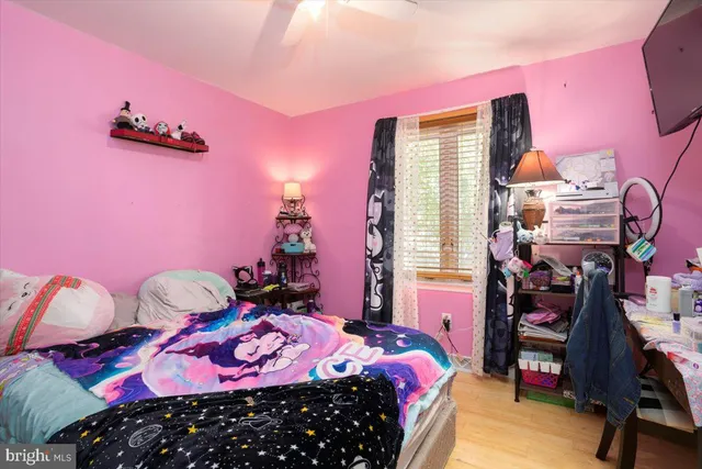 a bedroom with a bed and a closet