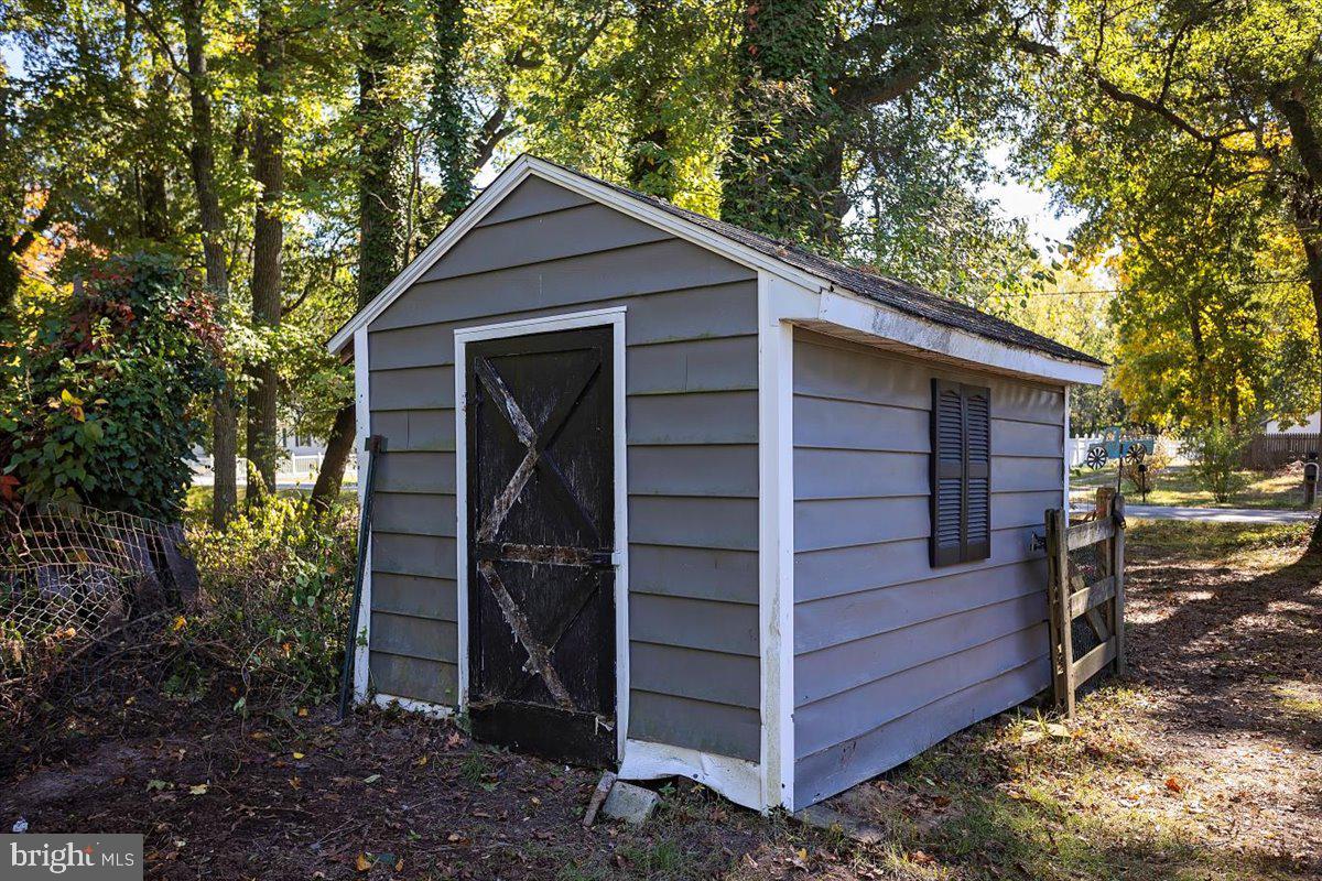 311 Kerr Avenue Denton, MD 21629 - Photo 20 of 22 a front view of a house with a yard