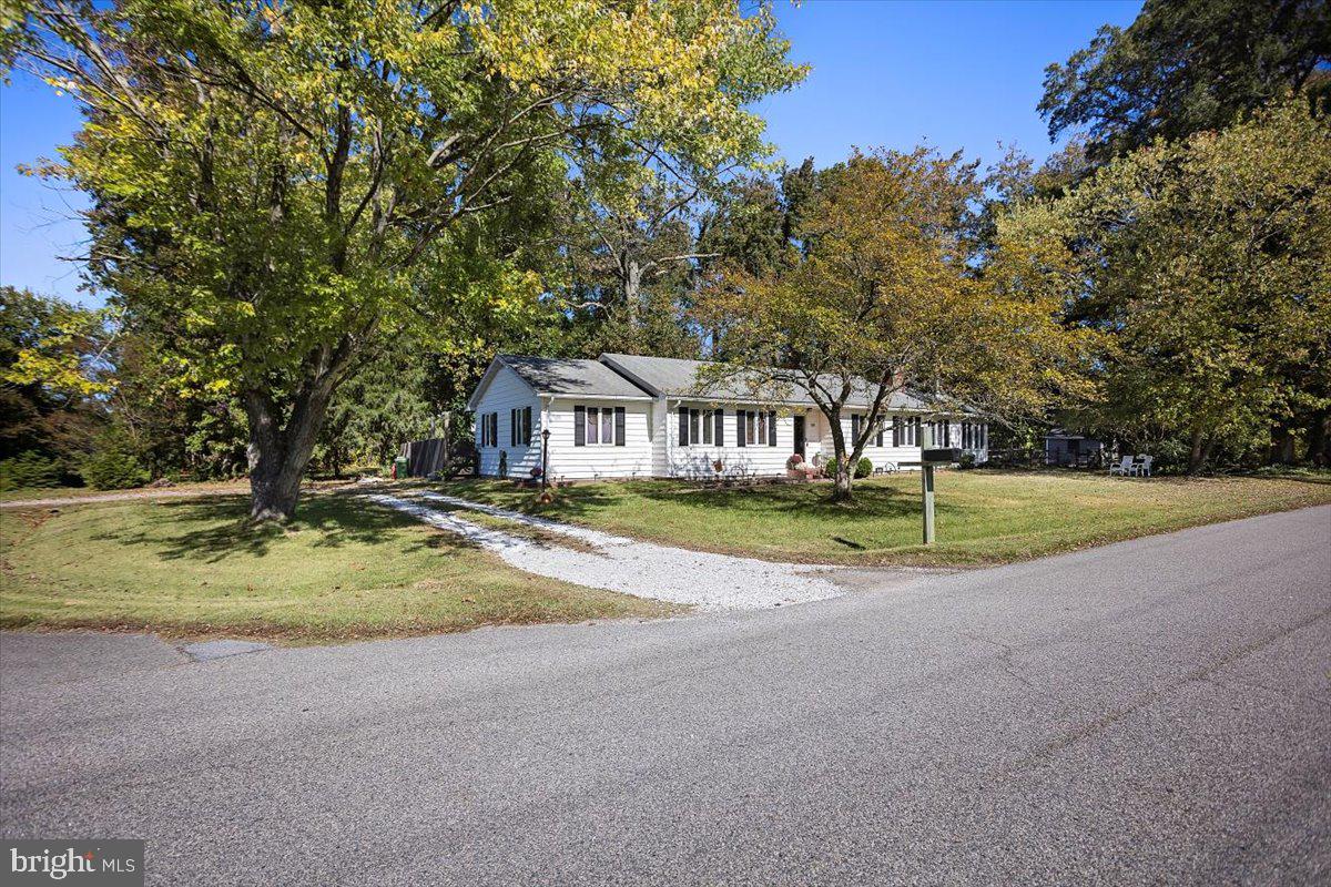 311 Kerr Avenue Denton, MD 21629 - Photo 2 of 22 a house with swimming pool in front of it