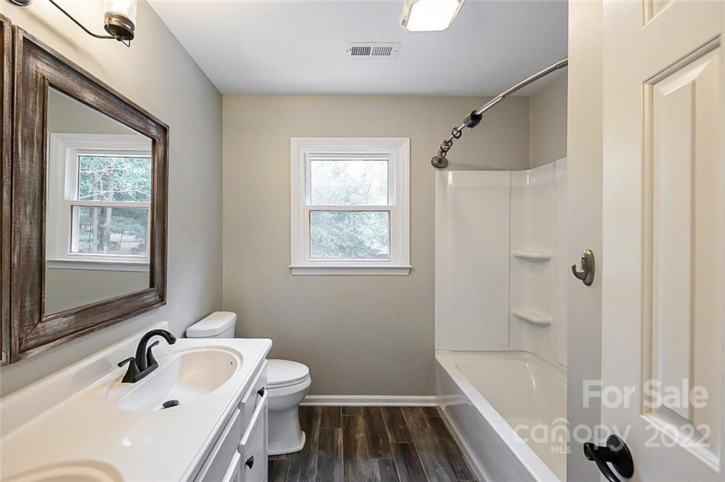 2927 Trotters Road Gastonia, NC 28054 - Photo 10 of 16 a bathroom with a sink and a tub