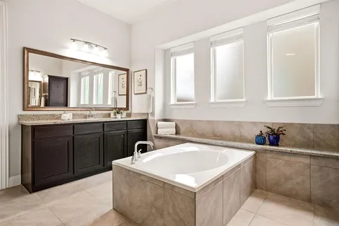 a bathroom with a sink and a bathtub