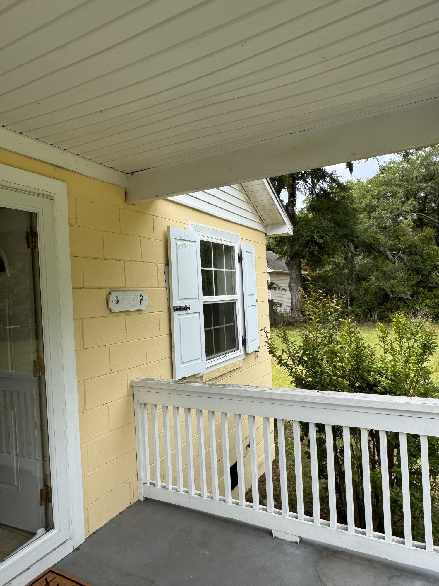 3476 Bohicket Road Johns Island, SC 29455 - Photo 4 of 35 front porch railing