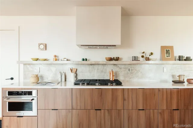 a bathroom with a sink a bathtub and a window