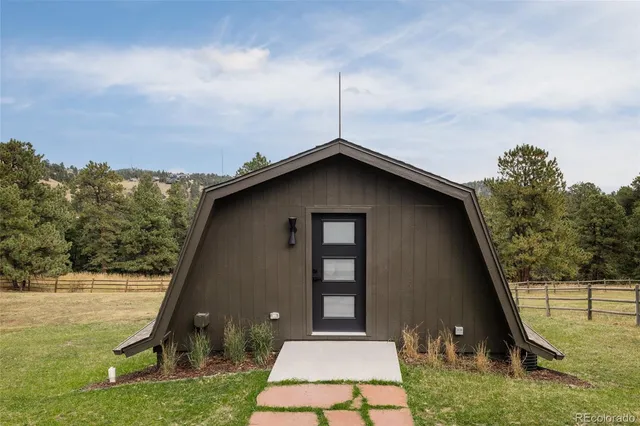 a kitchen with a stove top oven and sink