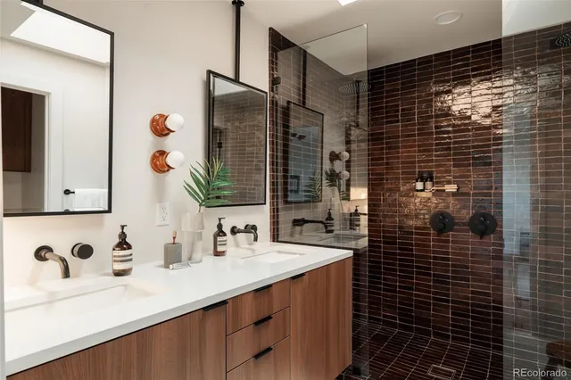 an aerial view of residential houses with outdoor space and river