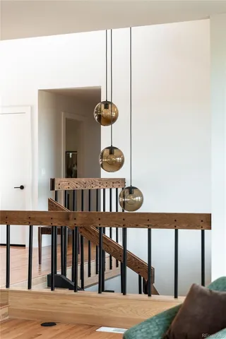 a bedroom with a bed and ceiling fan