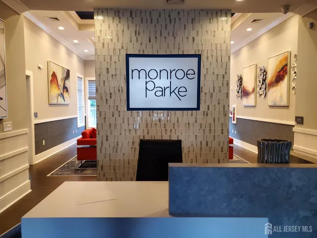 a room with furniture and a flat screen tv