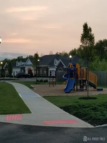 a view of door with wooden wall