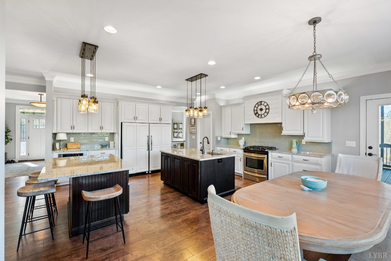 1249 Lees Mill Lane Goode, VA 24556 - Photo 16 of 98 a large kitchen with kitchen island a large island in the center