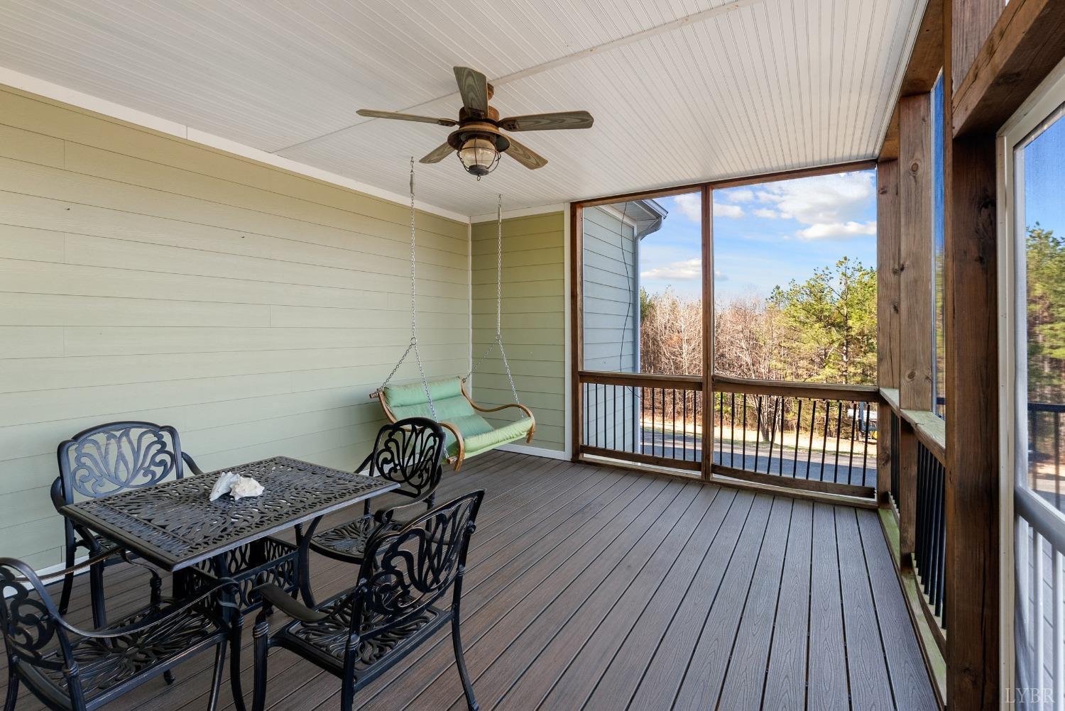 1249 Lees Mill Lane Goode, VA 24556 - Photo 23 of 98 a view of a dining room with furniture window and wooden floor
