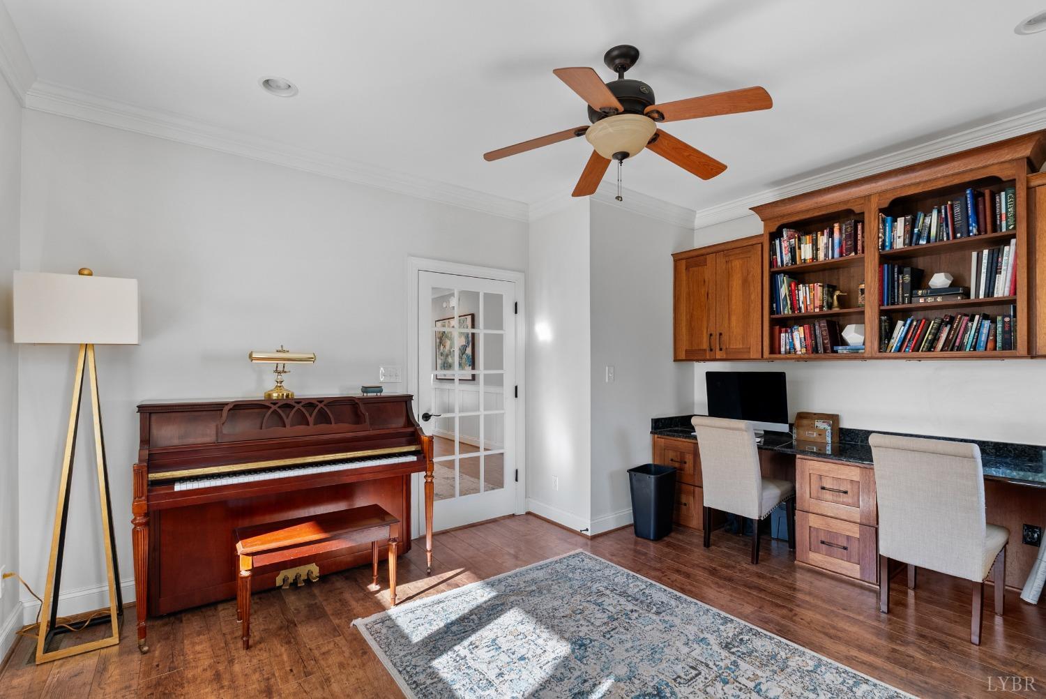1249 Lees Mill Lane Goode, VA 24556 - Photo 26 of 98 a living room with furniture a rug and a window