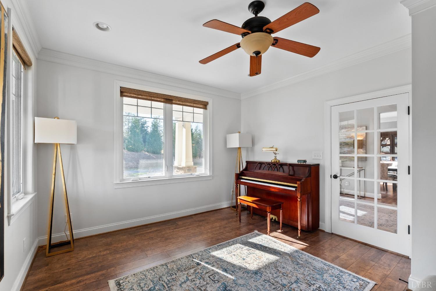 1249 Lees Mill Lane Goode, VA 24556 - Photo 27 of 98 a living room with a piano and a window