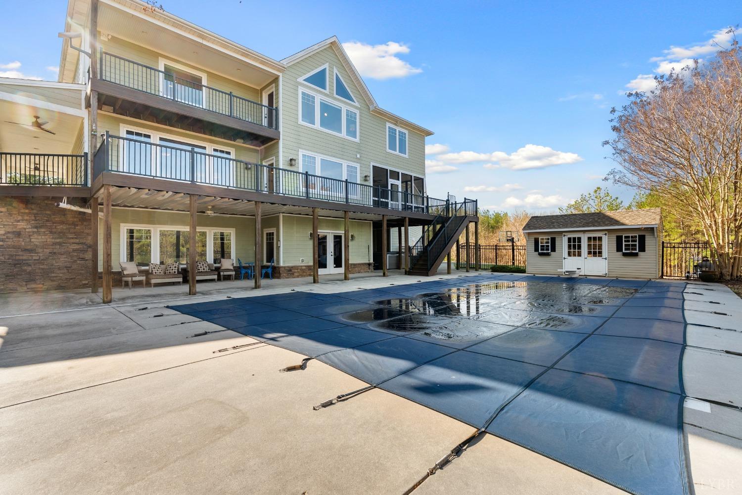 1249 Lees Mill Lane Goode, VA 24556 - Photo 69 of 98 a front view of a building with glass windows
