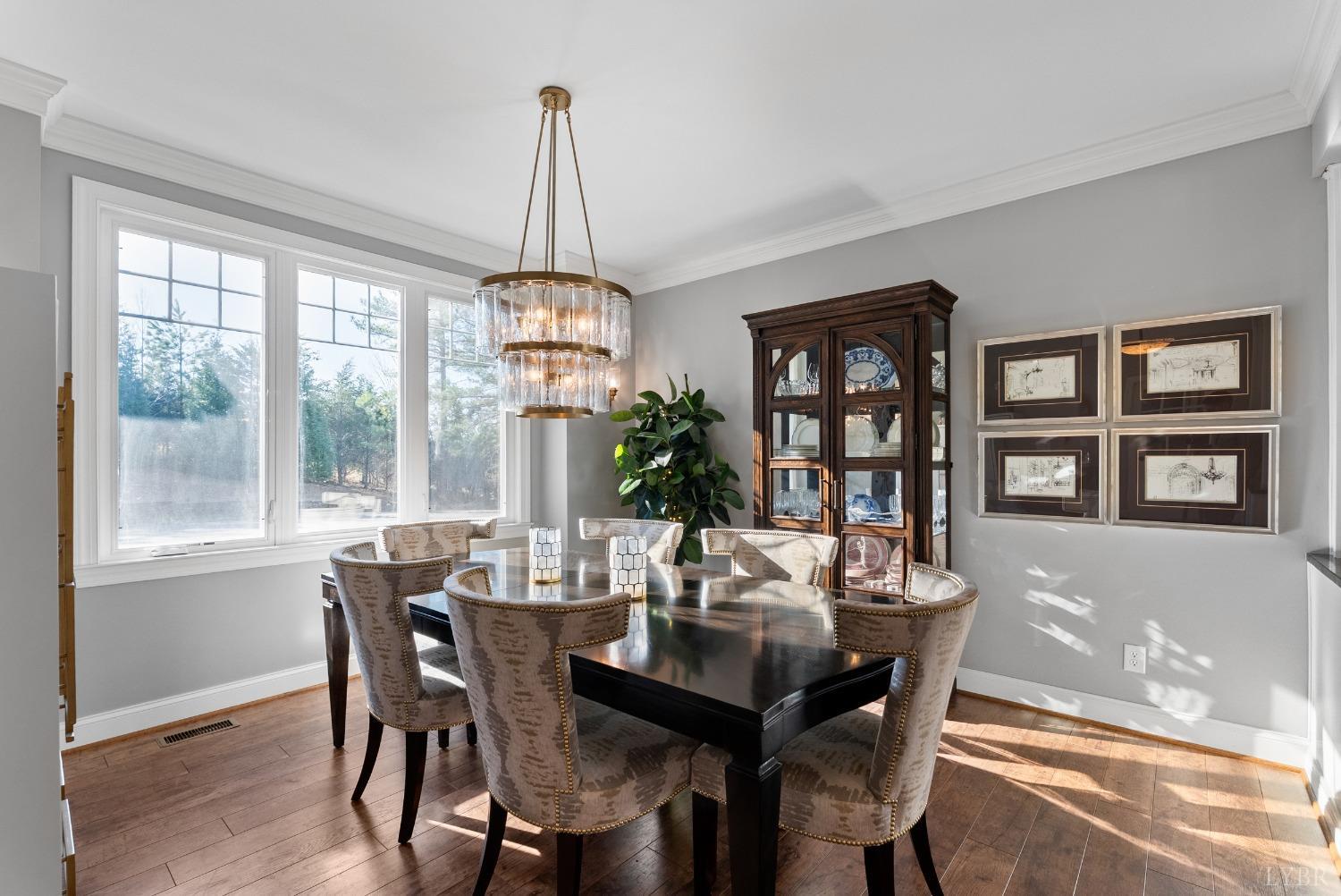 1249 Lees Mill Lane Goode, VA 24556 - Photo 8 of 98 a view of a dining room with furniture window and wooden floor