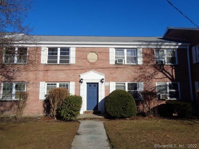 236 Seaton Road, Unit 2 Stamford, CT 06902 - Photo 1 of 1 a front view of a house with a yard