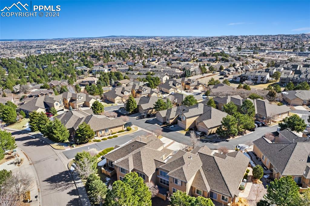 5655 Sonnet Ridge Point Colorado Springs, CO 80918 - Photo 40 of 47 Drone/aerial view of back of the property