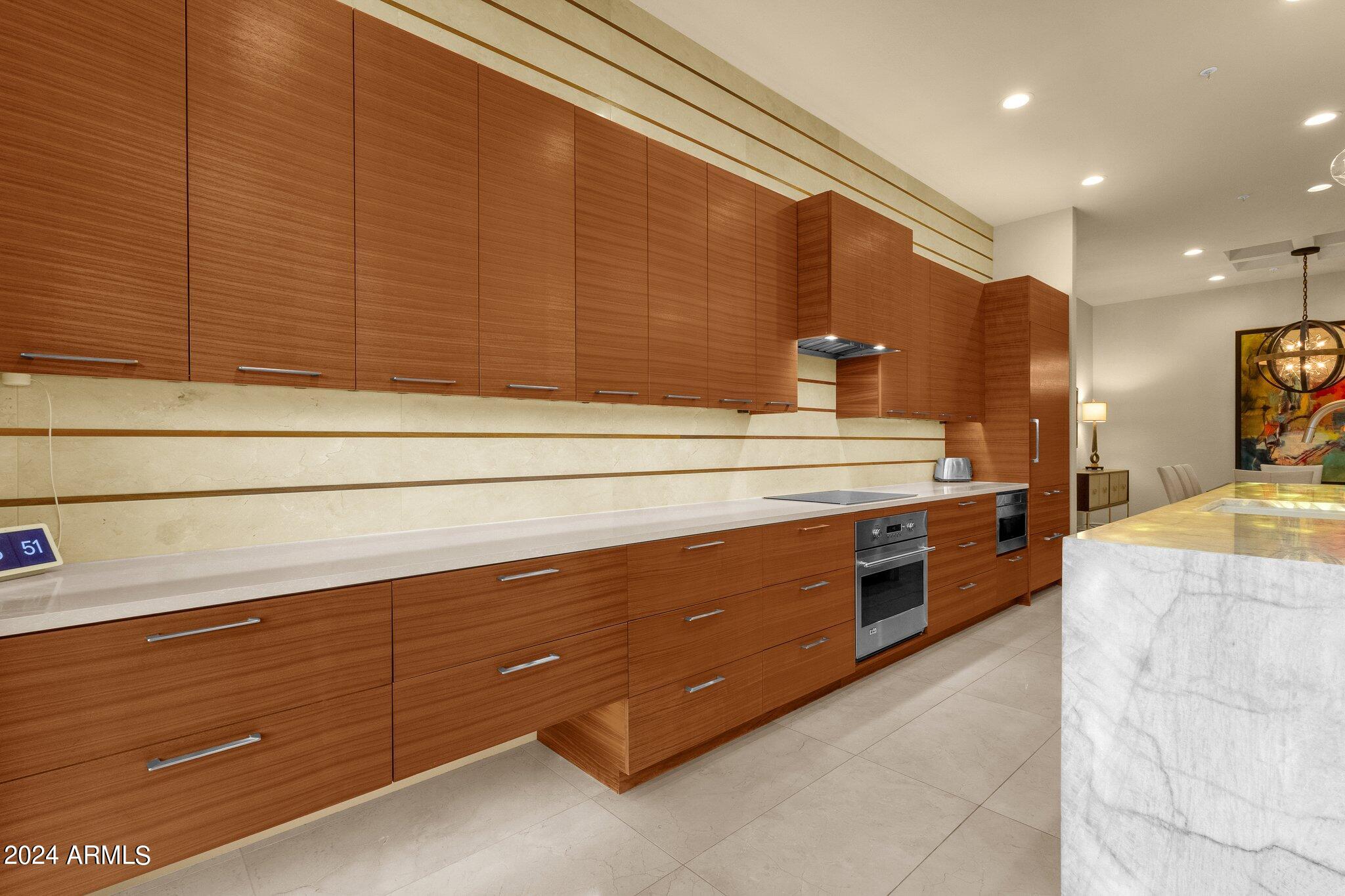 7222 East Gainey Ranch Road, Unit 144 Scottsdale, AZ 85258 - Photo 14 of 41 With Walnut Cabinetry