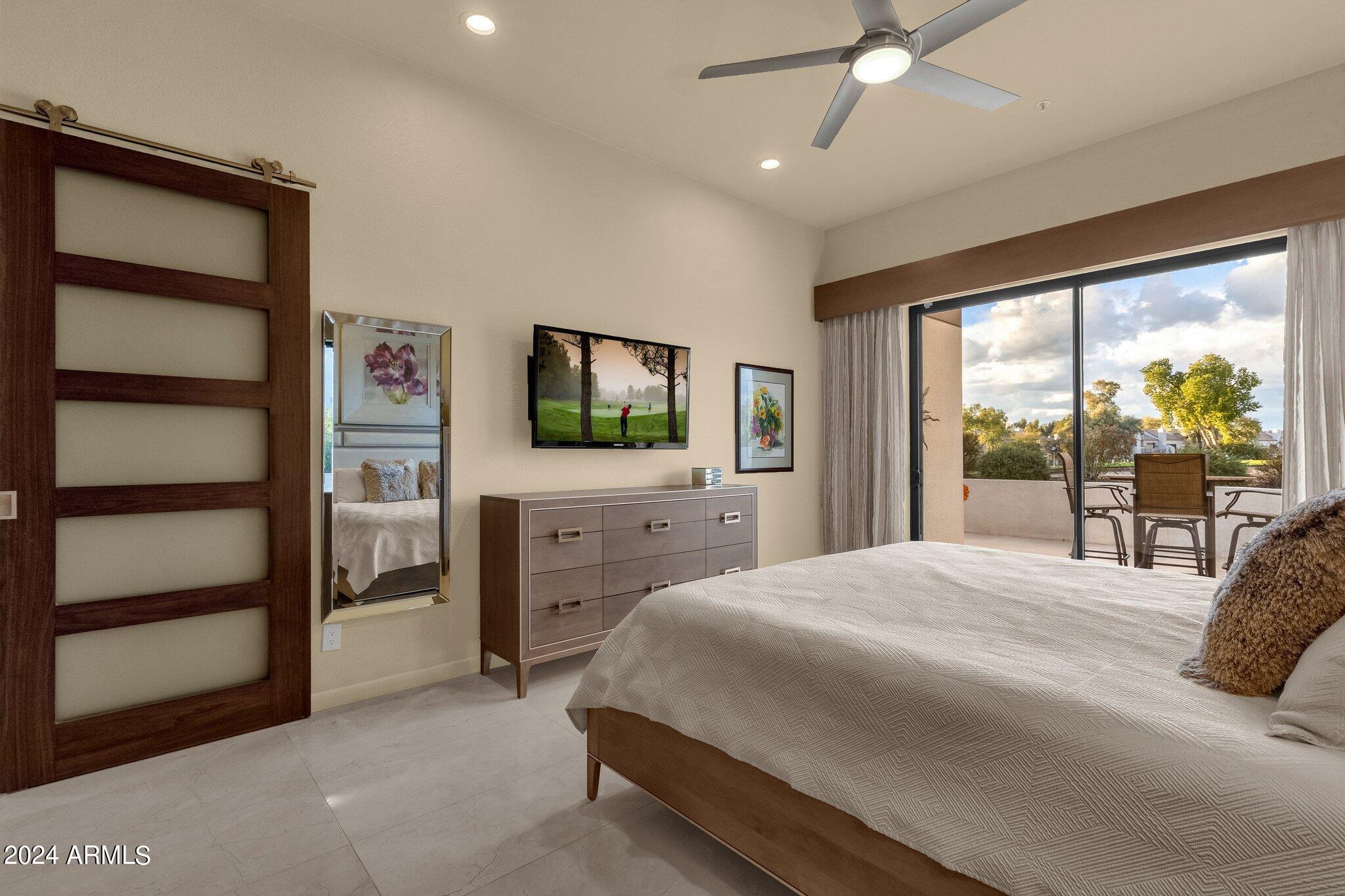 7222 East Gainey Ranch Road, Unit 144 Scottsdale, AZ 85258 - Photo 21 of 41 Master Bedroom Opens To The Patio
