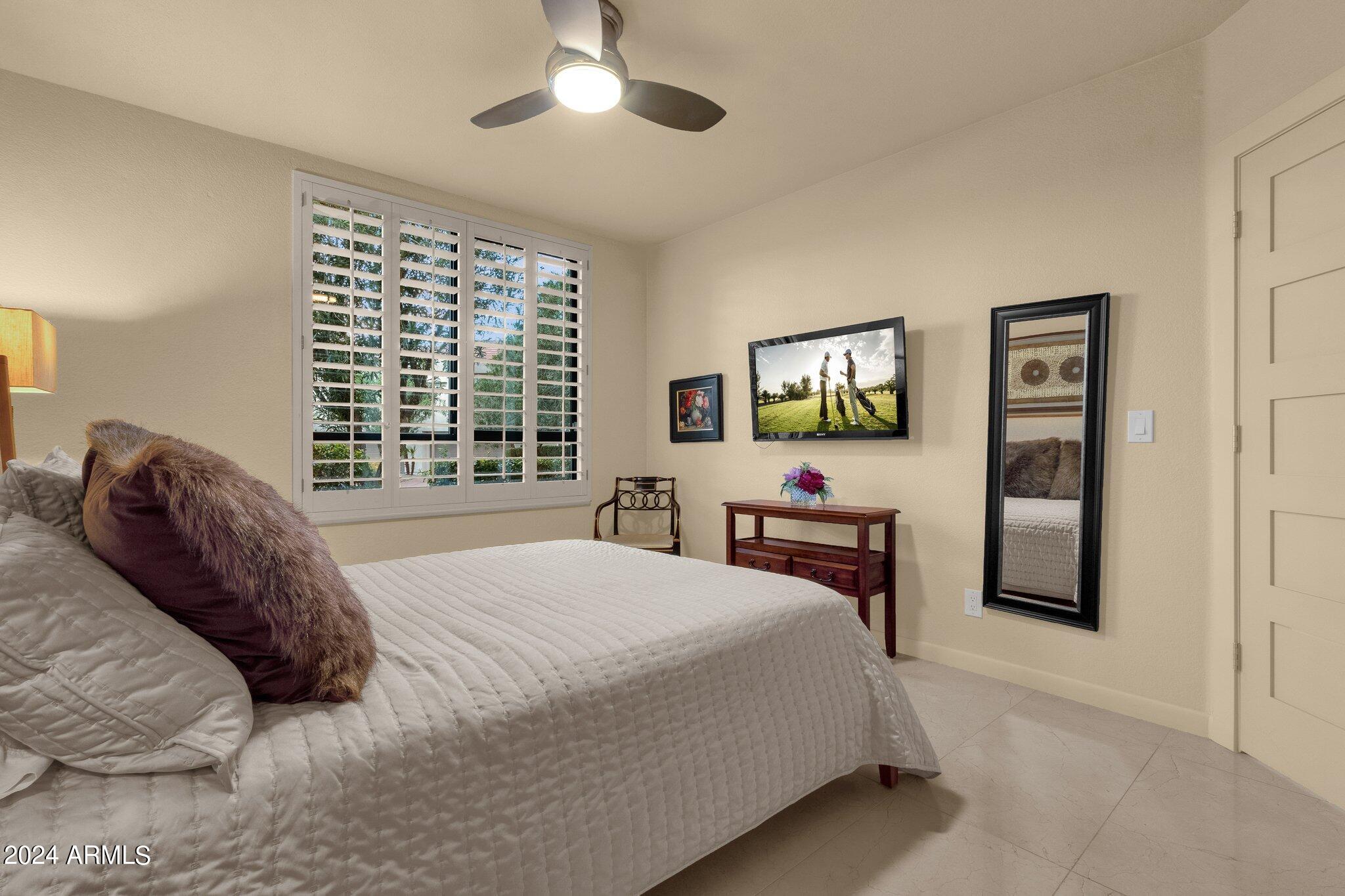 7222 East Gainey Ranch Road, Unit 144 Scottsdale, AZ 85258 - Photo 27 of 41 Guest Bedroom