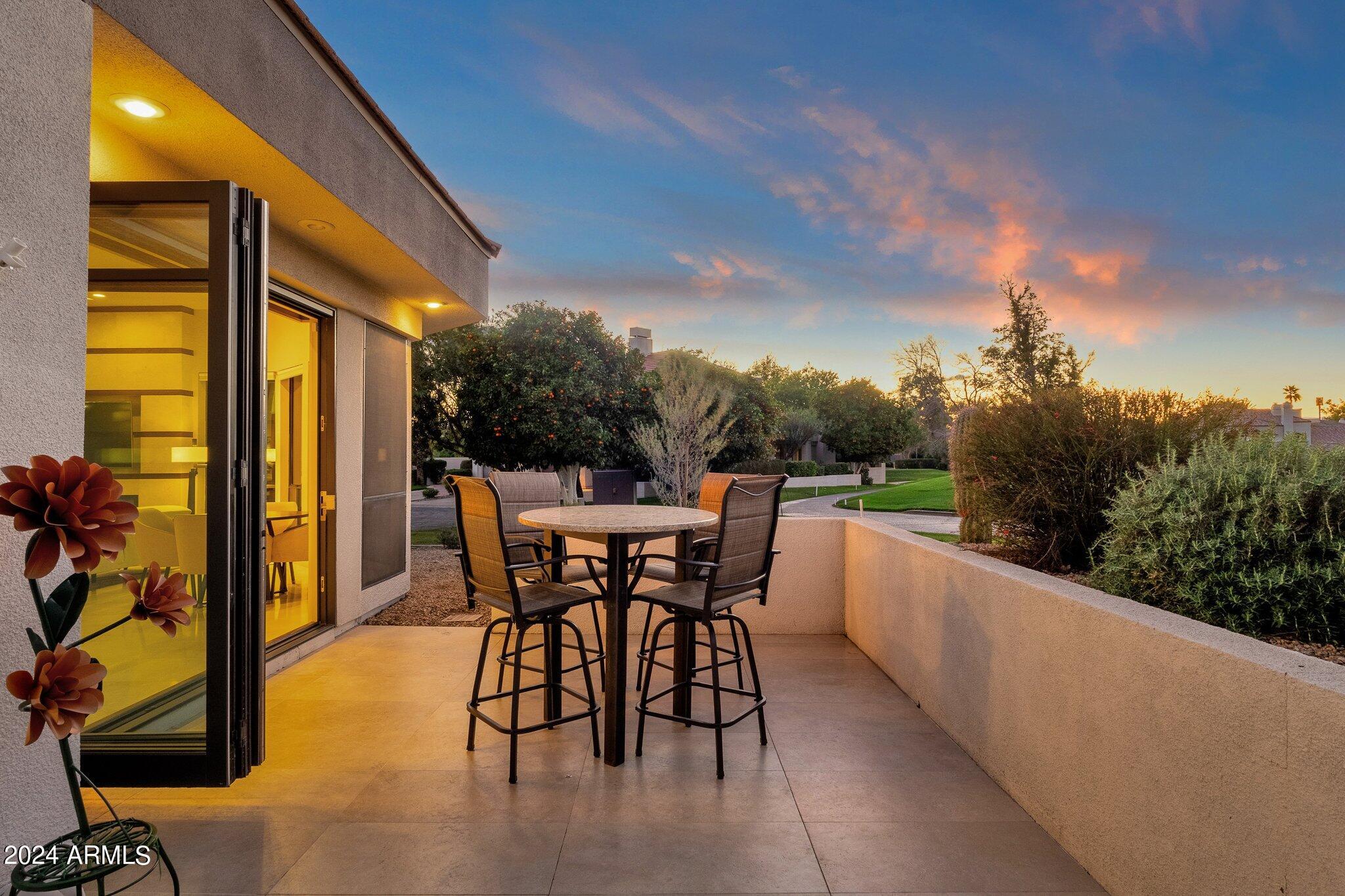 7222 East Gainey Ranch Road, Unit 144 Scottsdale, AZ 85258 - Photo 35 of 41 Weather Shield Bi-Fold Doors