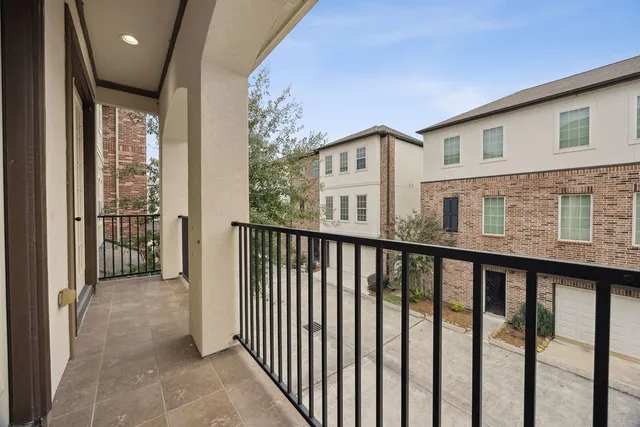 a view of a balcony with a porch