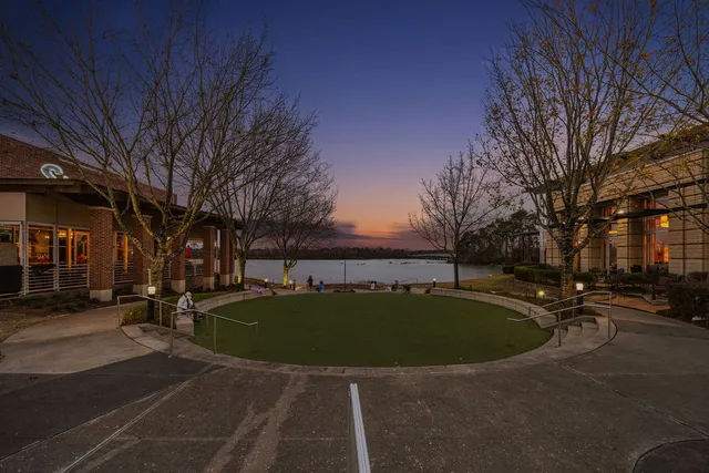 a view of pool with outdoor seating