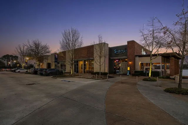 a front view of a building with a street