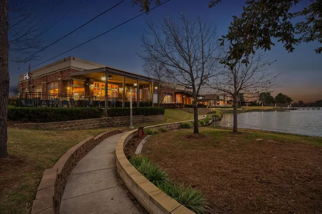 a view of a playground with a yard
