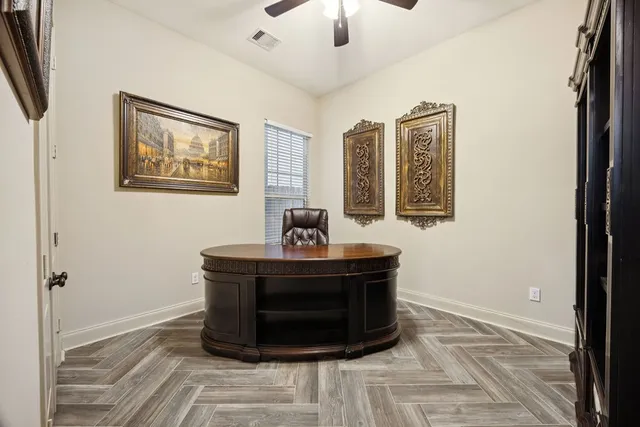 a view of living room with furniture and a chandelier