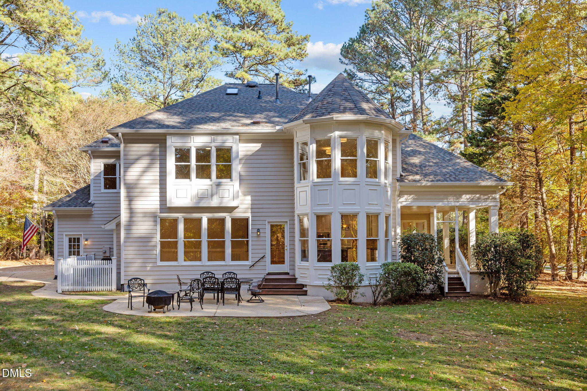 4741 Sharpstone Lane Raleigh, NC 27615 - Photo 52 of 59 a front view of a house with a garden and trees