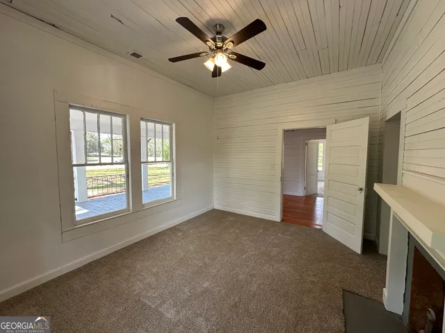 a view of a lake with a tree
