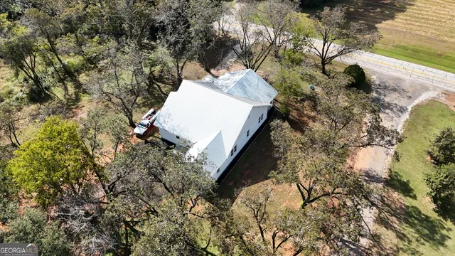 a view of a lake with a yard