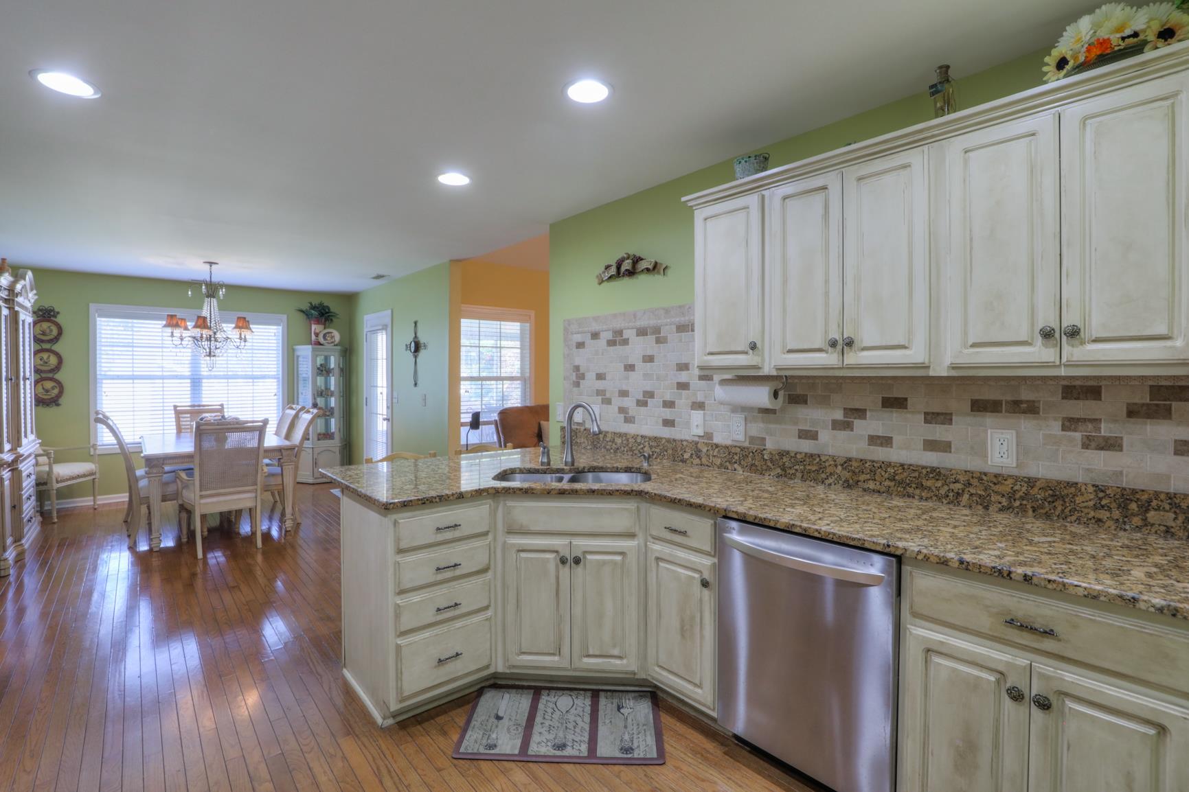 Cabinets have all just been repainted in a faux finish. 