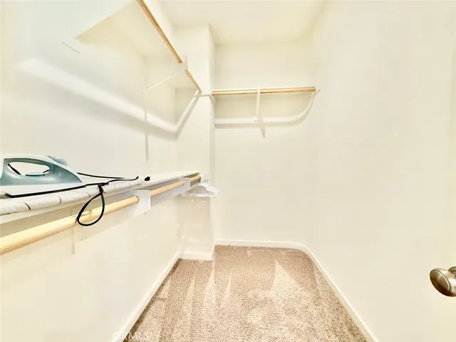 a view of a room with racks on the wall