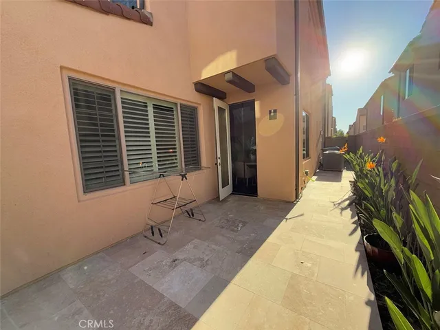 a backyard of a house with seating space