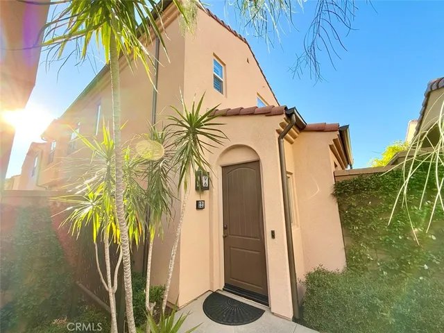 a view of a house with a small yard