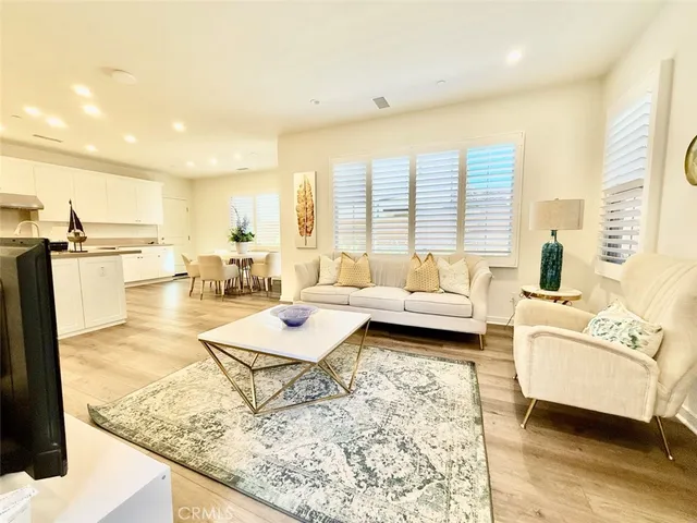 a living room with furniture and a table