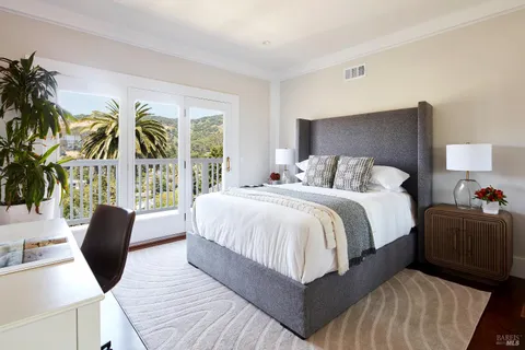 a bed room with a bed and a couch