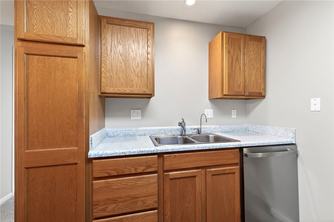 3151 Roesch Boulevard, Unit 6 Fairfield, OH 45014 - Photo 8 of 29 This kitchen features rich wood cabinetry and a functional layout, perfect for everyday living.